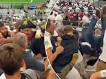 Fans are EJECTED from England’s Rugby World Cup quarter-final victory over Fiji after furious brawl in the stands involving a group of supporters dressed as Napoleon… with one victim FLUNG head-first into female spectators below