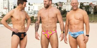 Mike Tindall poses in barely-there trunks on Sydney’s Bondi Beach with rugby pals to promote the trio’s podcast