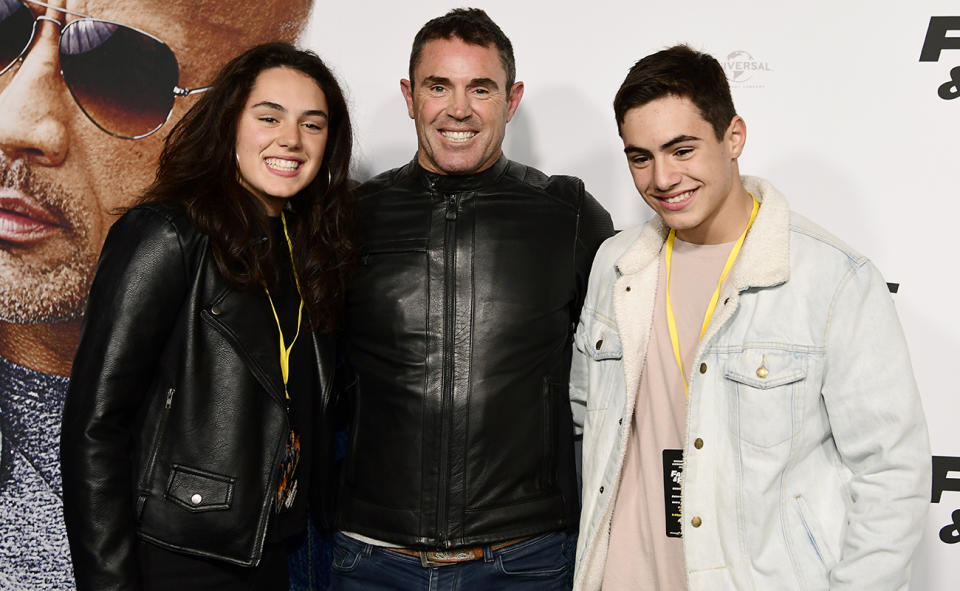 Brad Fittler, pictured here with daughter Demi and son Zach in 2019.