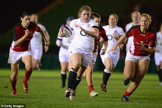 Ms Acheson (pictured playing for England Women in 2014) was 'belittled' and targeted by Crew Manager Dean Davies and Watch Manager Simon Bailey, it was found