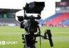 A TV camera pitchside at Sale Sharks' AJ Bell Stadium
