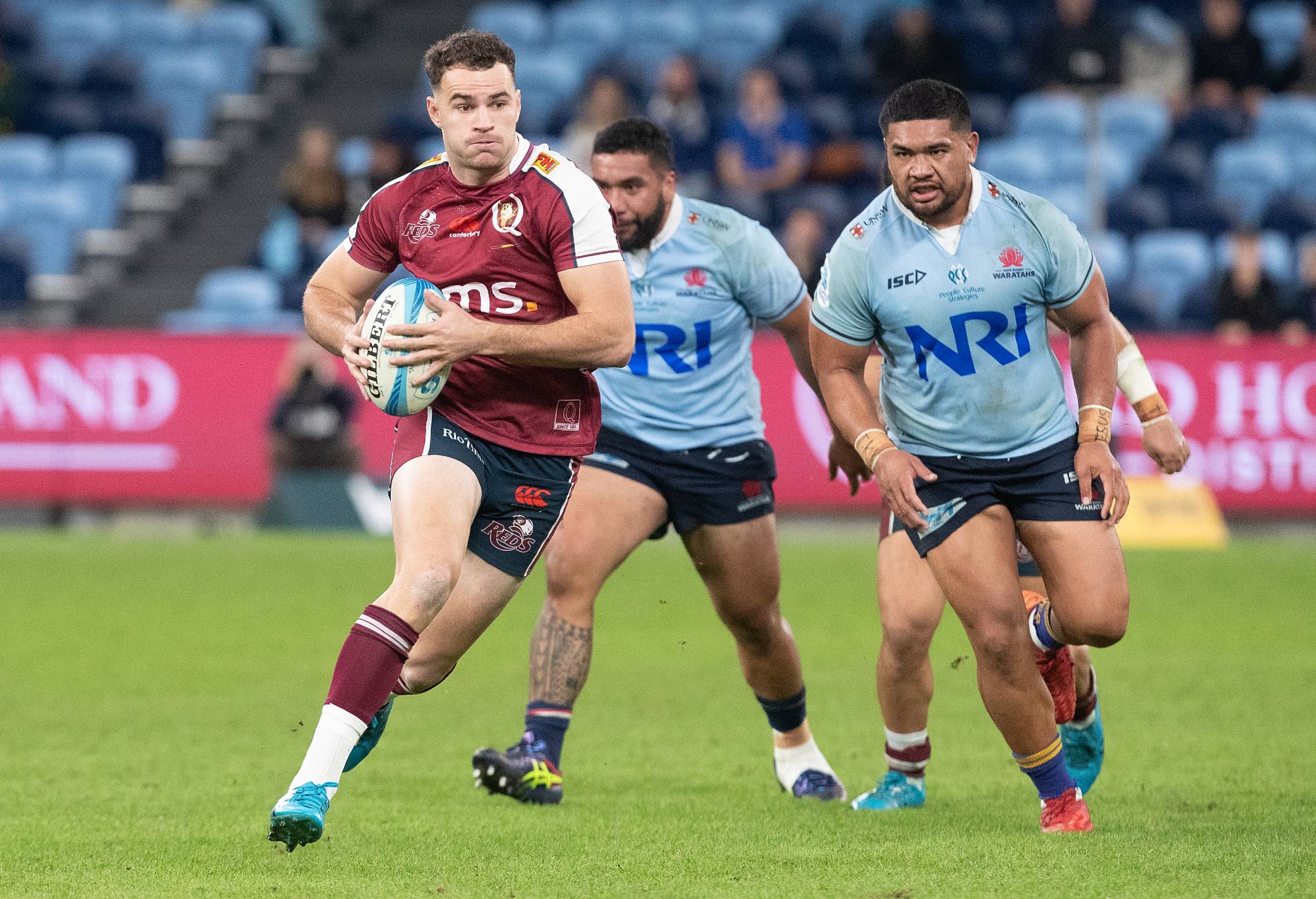 Taj Annan of the Red's runs the ball during the round 15 Super Rugby Pacific match between NSW Waratahs and Queensland Reds at Allianz Stadium, on May 31, 2024, in Sydney, Australia. (Photo by Steve Christo - Corbis/Corbis via Getty Images)