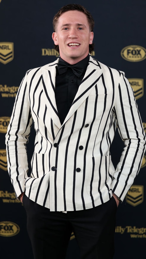 Cooper Johns in a black and white striped blazer 