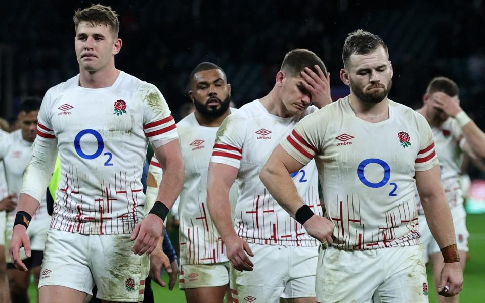 Freddie Steward, (L) Owen Farrell (C) and Luke Cowan-Dickie of England look dejected after their defeat during the Autumn international match between England and South Africa at Twickenham