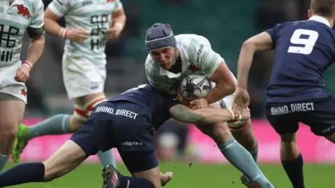 Getty Images Koster being tackled during the Oxford University vs Cambridge University Mens Varsity match at Twickenham Stadium in 2017