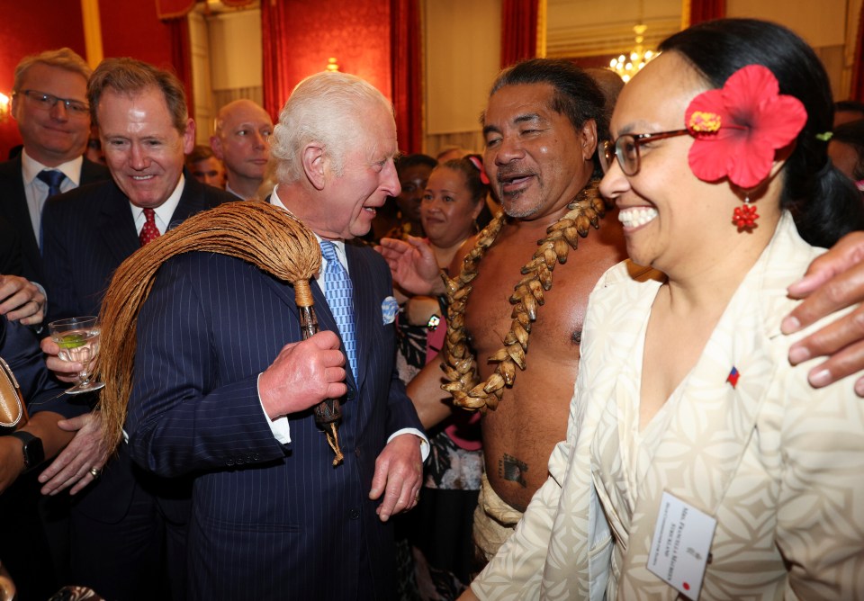 Charles was also given a ceremonial fly swat by ex-rugby player Freddie Tuilagi