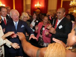 Upbeat Charles shows off his dance moves as he welcomes Grace Jones & ex-rugby star at glitzy Commonwealth reception