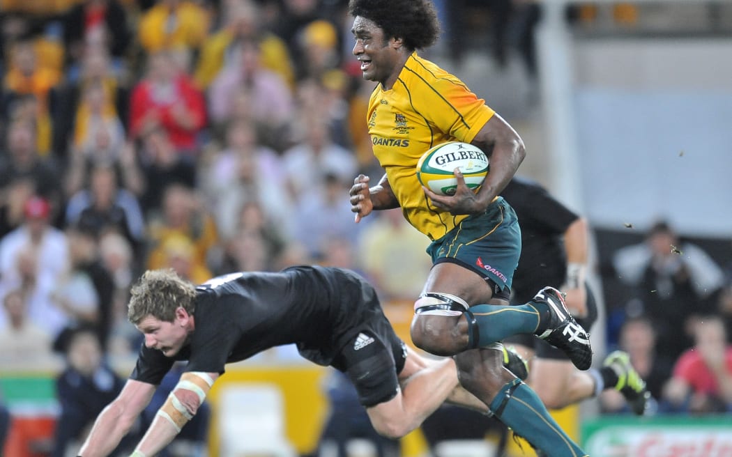 Radike Samo runs in clear space on his way to score for Australia in 2011.