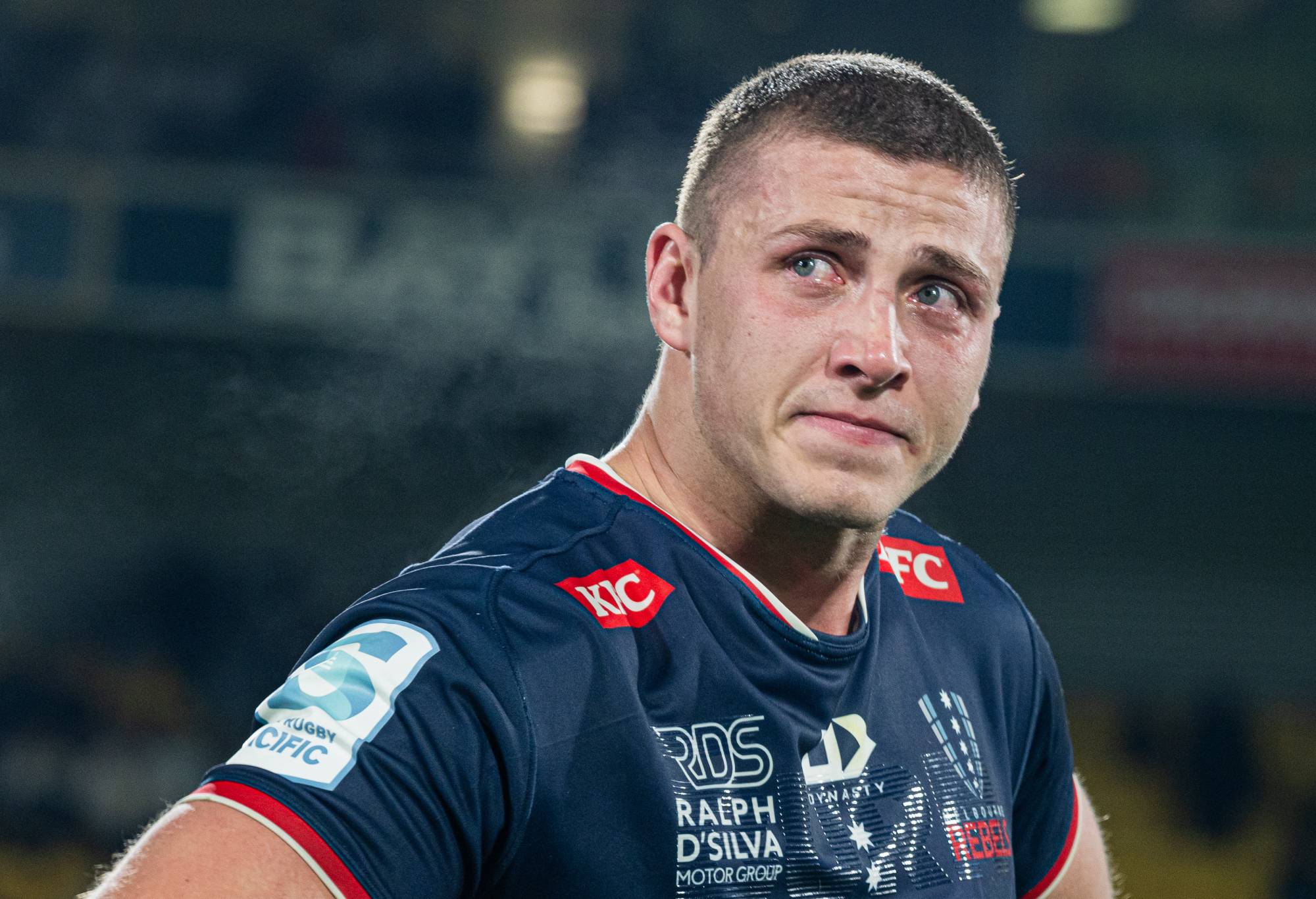 Melbourne Rebels right lock emotionally looks on after his team's defeat in their last ever game after the Hurricanes and Melbourne Rebels fixture at the Sky Stadium on June 8th, 2024 in Wellington, New Zealand. (Photo by James Foy/Speed Media/Icon Sportswire via Getty Images)