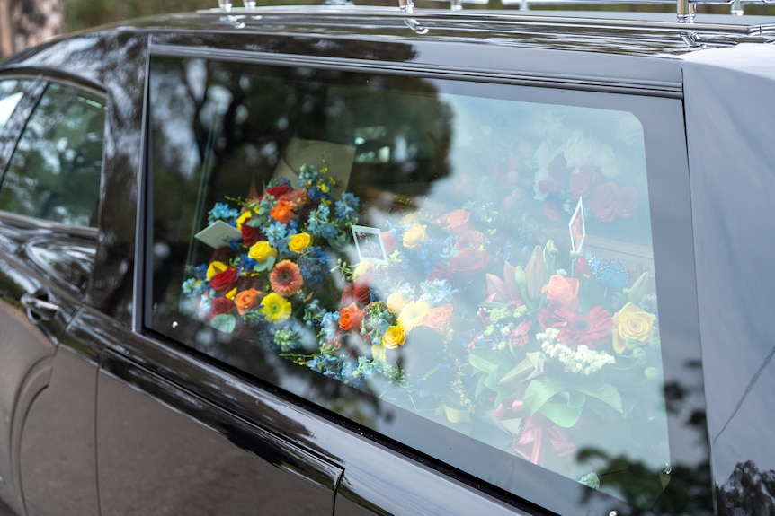 Flowers inside a hearse