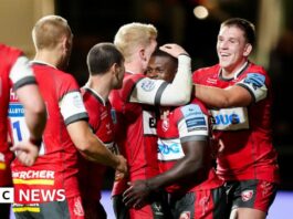 Gloucester's Christian Wade is congratulated by his teammates after scoring a try during the Gallagher Premiership match at Ashton Gate, Bristol.