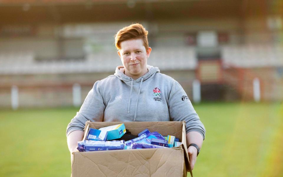 Jess Bunyard the head coach of the womens team Huddersfield YMCA RFC holding the 