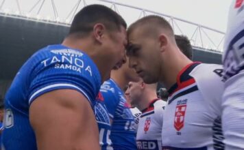 England rugby star butts heads with rival during 'feisty' Samoa Siva Tau dance