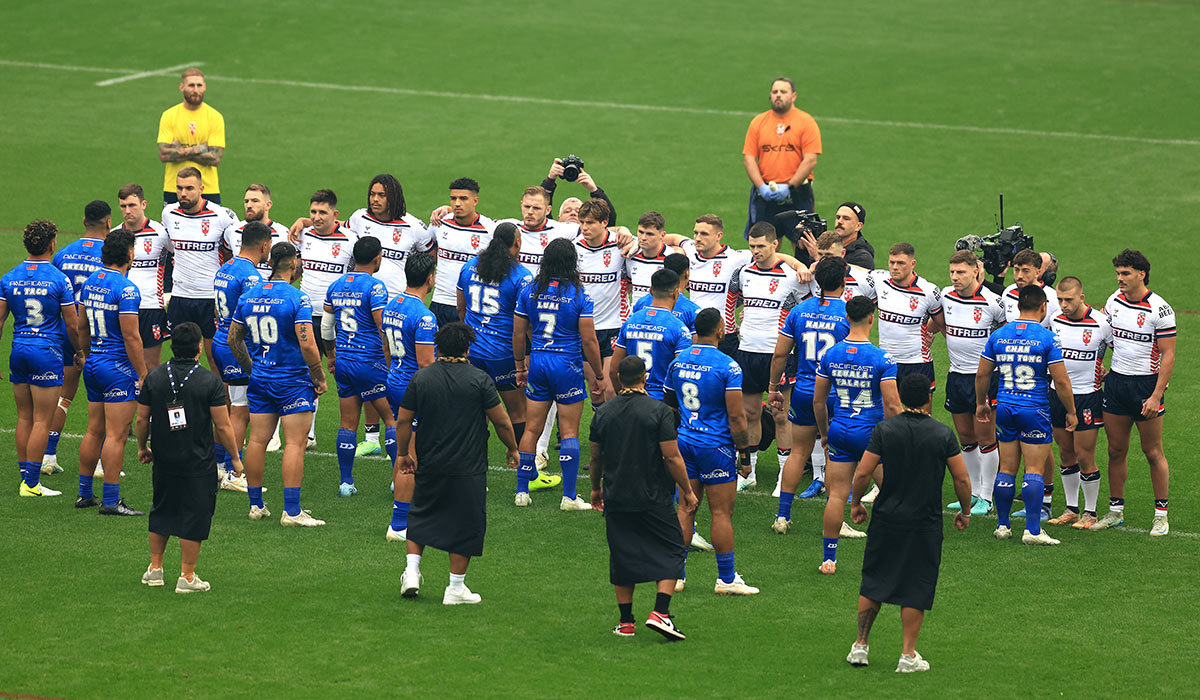 Players of England line-up as Samoa perform The Siva Tau prior to the Autumn International Series test match between the sides at Brick Community Stadium in Wigan. Pic: Jess Hornby/Getty Images