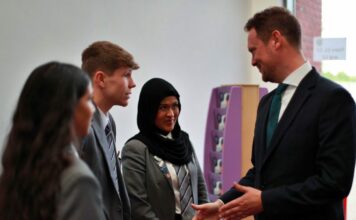 Minister's visit creates 'buzz' at Rugby secondary school