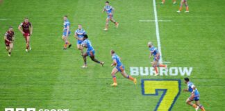 Headingley Stadium with a tribute to Rob Burrow on the pitch during a game