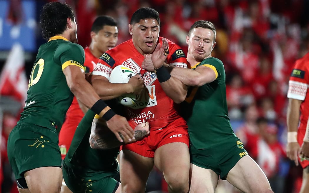 Jason Taumalolo hits the ball up against Australia