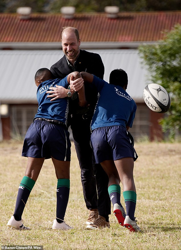 Prince William during a rugby session at Ocean View Secondary School in Cape Town today