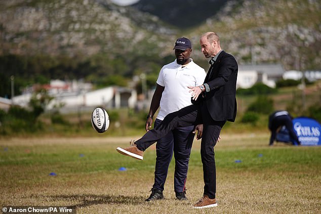 The Prince of Wales plays rugby today at Ocean View Secondary School in Cape Town