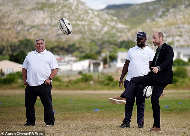 The Prince of Wales plays rugby today at Ocean View Secondary School in Cape Town