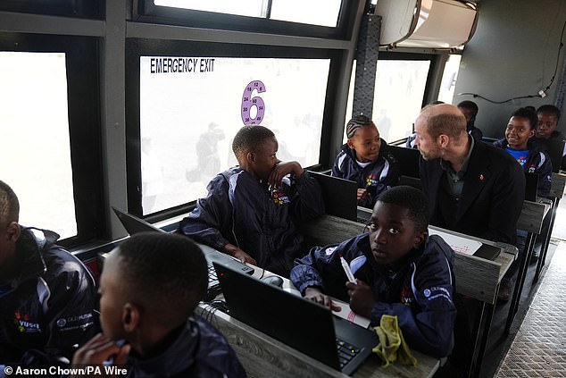 The Prince of Wales meets primary school children from Langa Township in Cape Town today