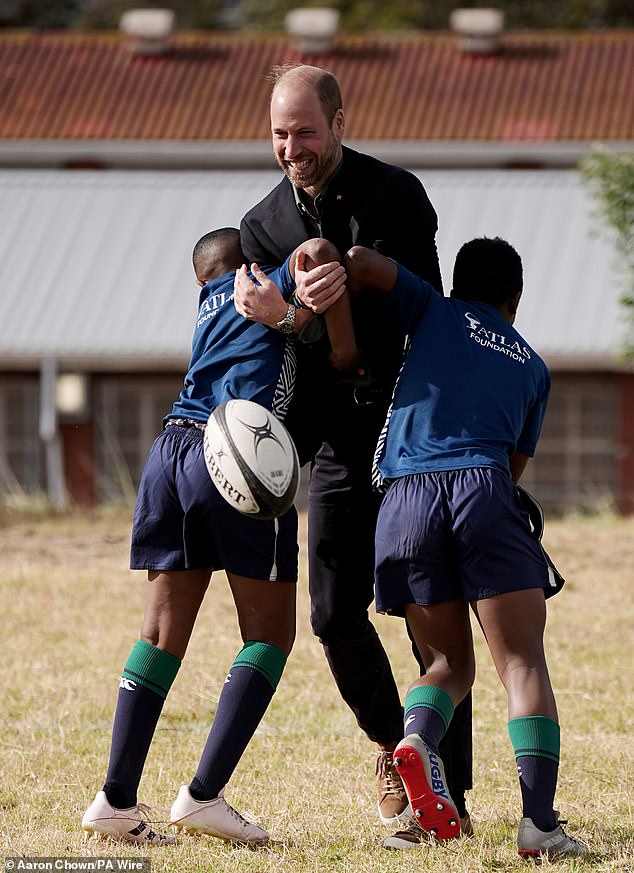 Prince William during a rugby session at Ocean View Secondary School in Cape Town today