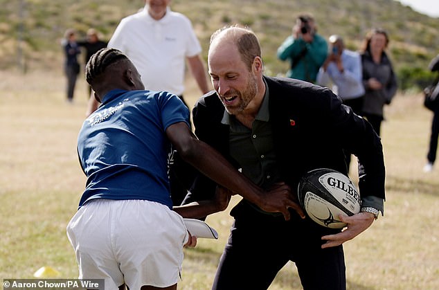 The Prince of Wales plays rugby today at Ocean View Secondary School in Cape Town