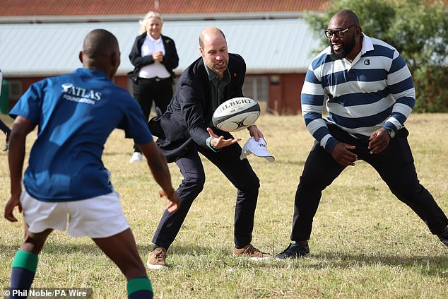 The Prince of Wales plays rugby today at Ocean View Secondary School in Cape Town