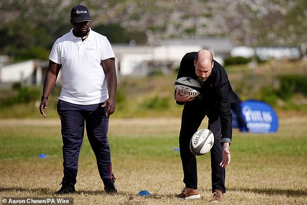 Prince William during a rugby session at Ocean View Secondary School in Cape Town today