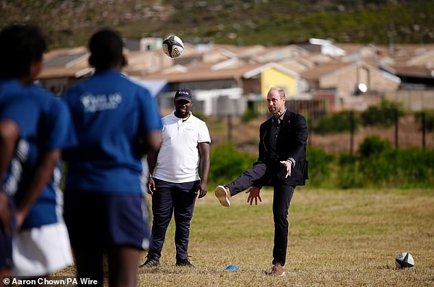 The Prince of Wales plays rugby today at Ocean View Secondary School in Cape Town