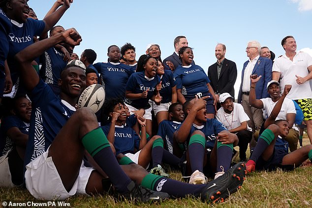 The Prince of Wales poses for a photo at Ocean View Secondary School in Cape Town today