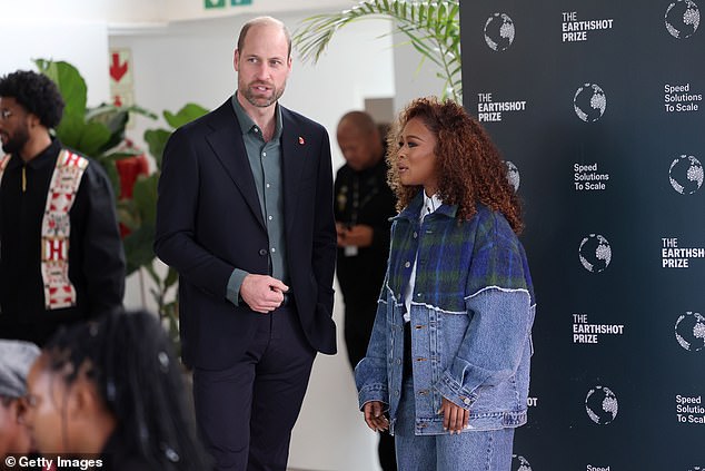 Prince William speaks with South African actress Nomzamo Mbatha in Cape Town today