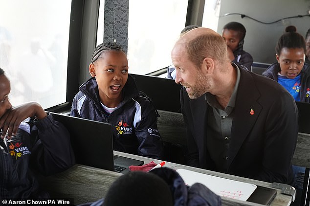 The Prince of Wales meets primary school children from Langa Township in Cape Town today