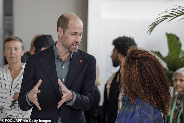 Prince William speaks with South African actress Nomzamo Mbatha in Cape Town today