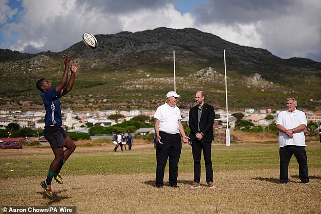 The Prince of Wales plays rugby today at Ocean View Secondary School in Cape Town