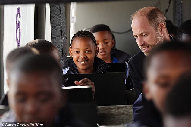 The Prince of Wales meets primary school children from Langa Township in Cape Town today