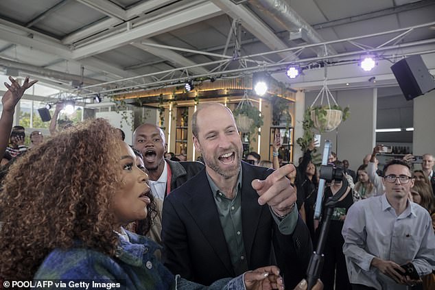 Prince William takes a selfie with South African actress Nomzamo Mbatha in Cape Town today