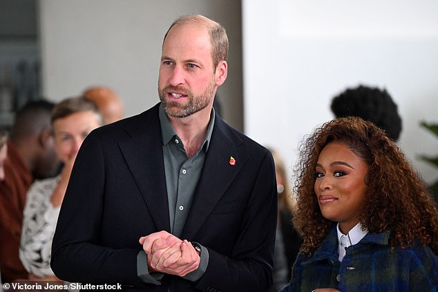 Prince William speaks with South African actress Nomzamo Mbatha in Cape Town today