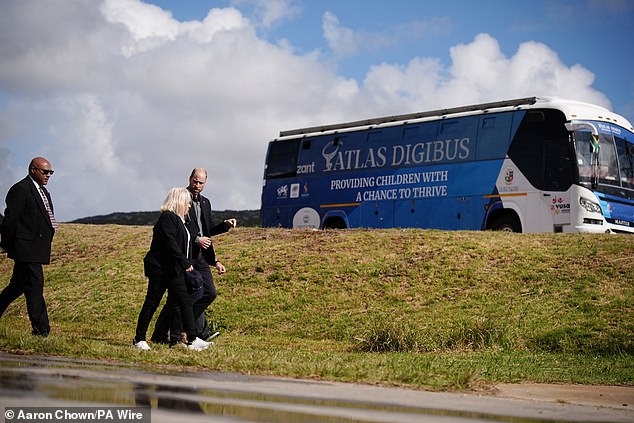 The Prince of Wales arrives to meet primary school children from Langa Township today