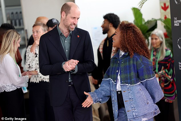 Prince William speaks with South African actress Nomzamo Mbatha in Cape Town today