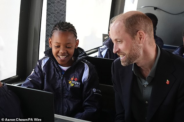 The Prince of Wales meets primary school children from Langa Township in Cape Town today