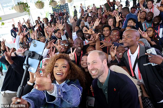 Prince William takes a selfie with South African actress Nomzamo Mbatha in Cape Town today