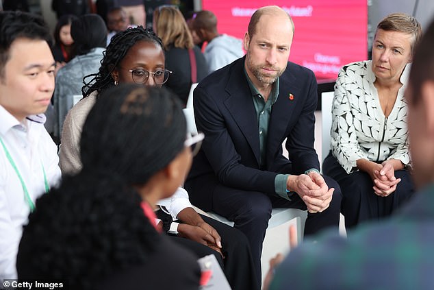 Prince William arrives to meet head girl Lyndel Musandida at Ocean View Secondary School