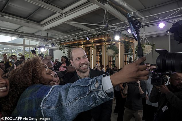 Prince William takes a selfie with South African actress Nomzamo Mbatha in Cape Town today