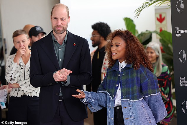 Prince William speaks with South African actress Nomzamo Mbatha in Cape Town today