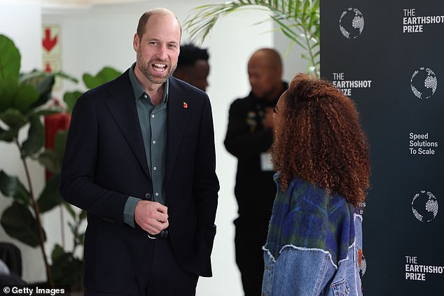 Prince William speaks with South African actress Nomzamo Mbatha in Cape Town today