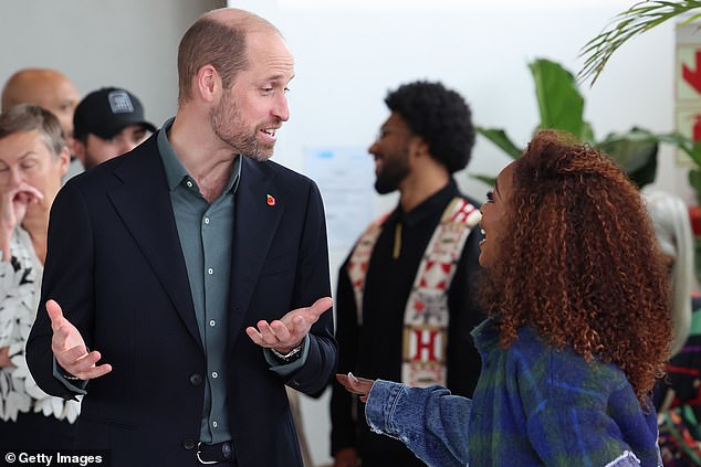 Prince William speaks with South African actress Nomzamo Mbatha in Cape Town today