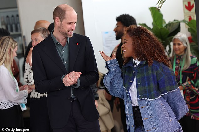 Prince William speaks with South African actress Nomzamo Mbatha in Cape Town today