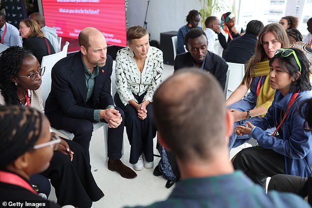 William and Earthshot chief executive Hannah Jones speak to a group in Cape Town today