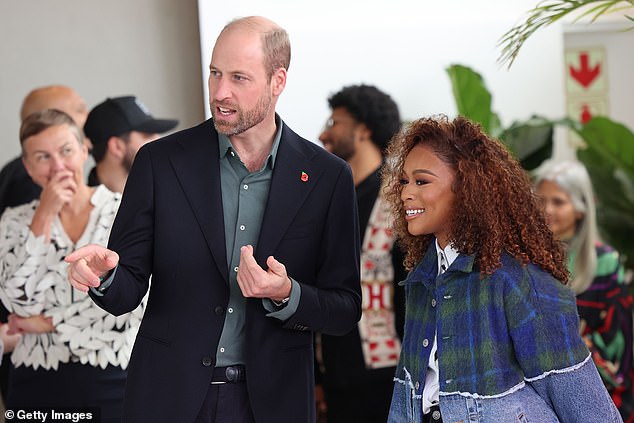 Prince William speaks with South African actress Nomzamo Mbatha in Cape Town today